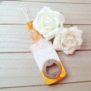 Flaschenöffner Orange/Weiß "Einer geht noch Prost"